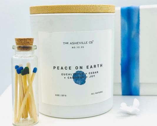 Peace on Earth Candle made by The ASHEVILLE CO with blue, white and green matches in match jar with dove bird and gift box with blue silk ribbon
